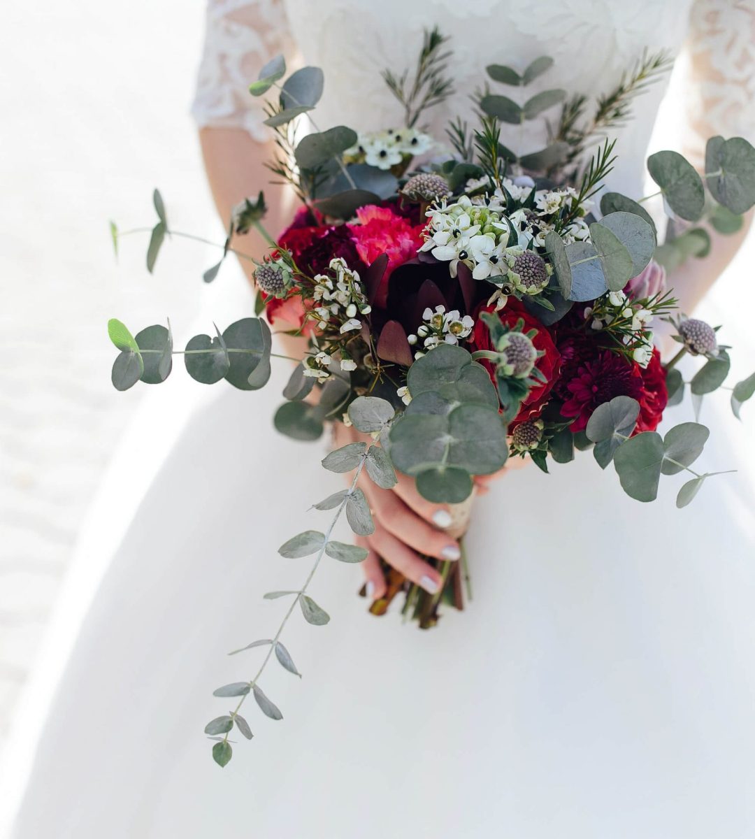 bride-holding-wedding-bouquet-PML4PZN-1-scaled.jpg